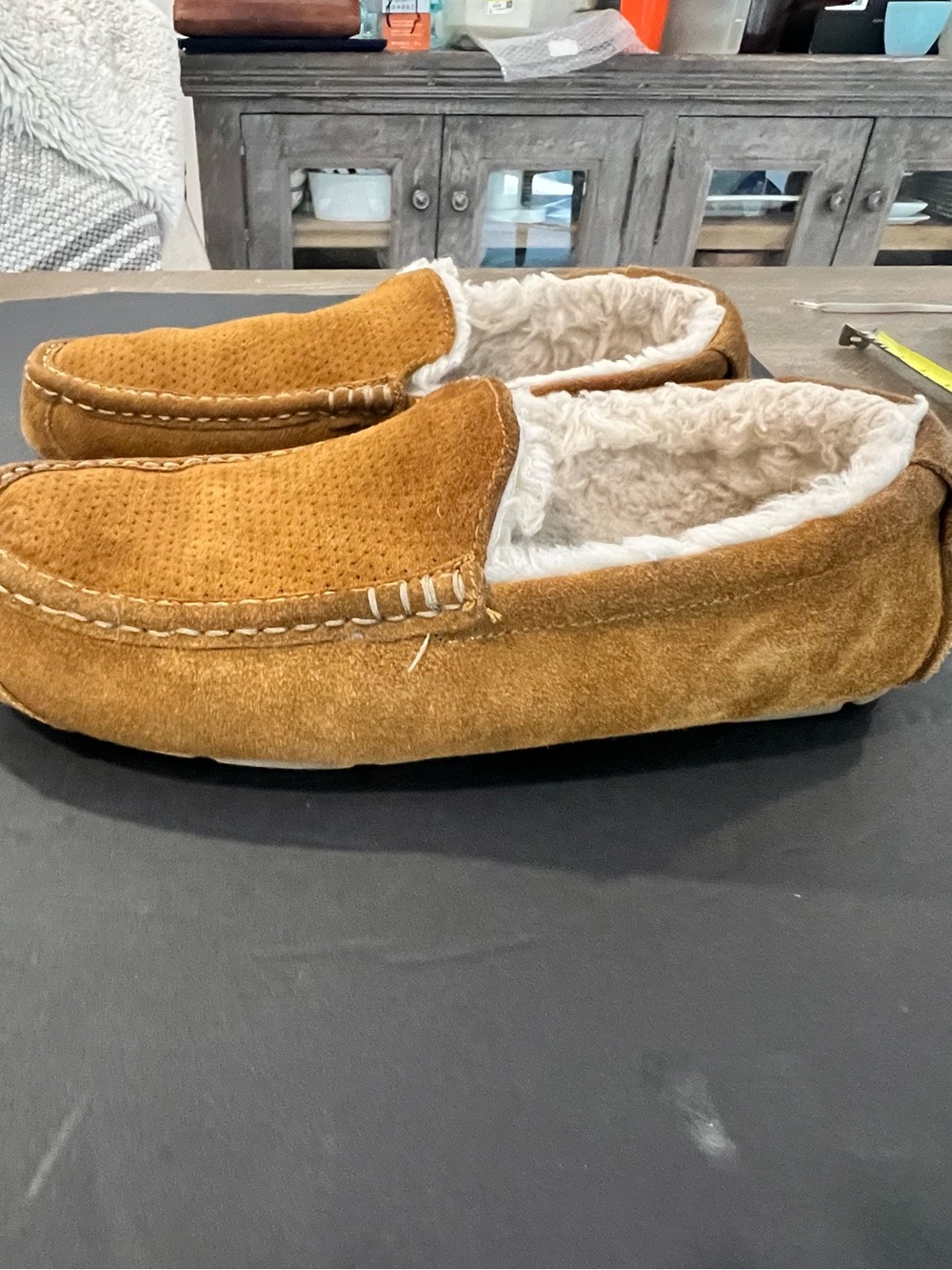 Koolaburra Men's Suede Slip-On Moccasin in Chestnut Brown with Cream Lining